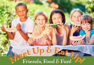 Children eating watermelon in the summer